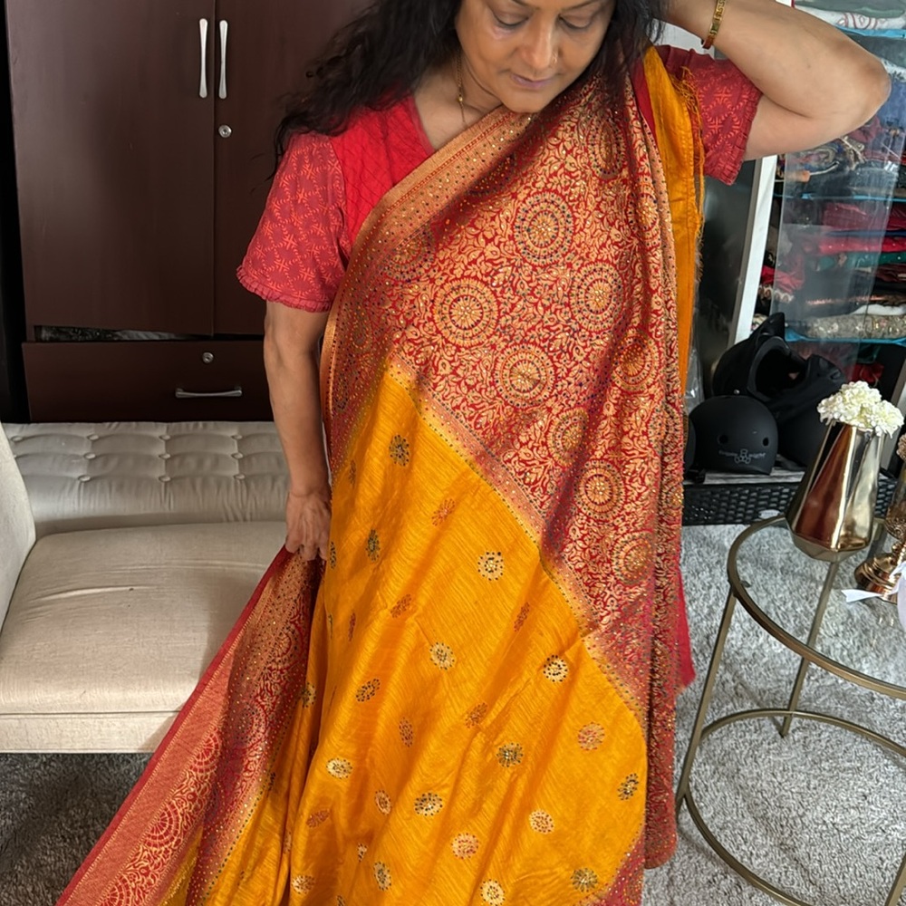 Yellow saree with red border